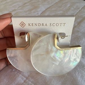 Kendra Scott earrings.